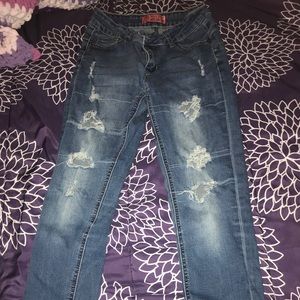 High waisted distressed jeans